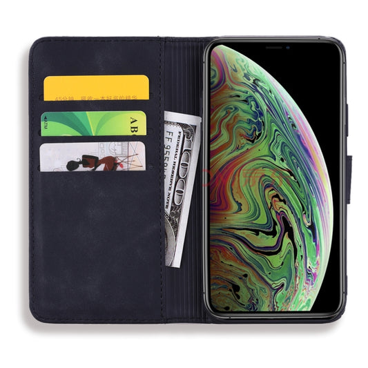 iPhone 11 Pro Max case detail displaying embossed calf leather texture and card slot design