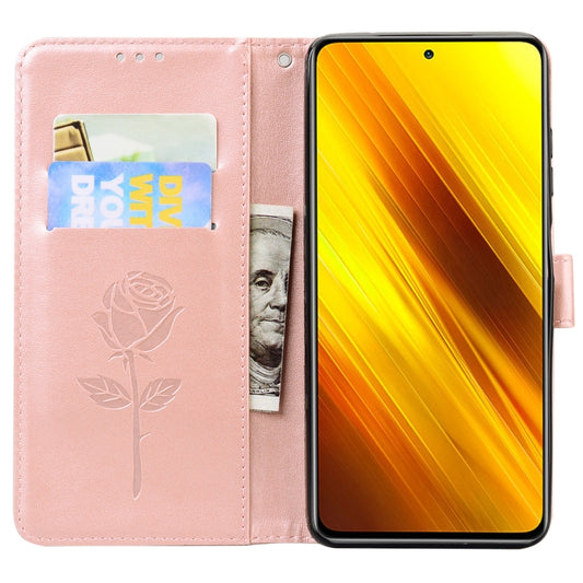 Poco X3 NFC secured in open flip case displaying rose pattern and card slots