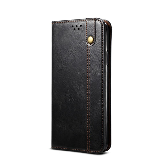 Premium wax leather texture phone case showing card slot details and magnetic closure