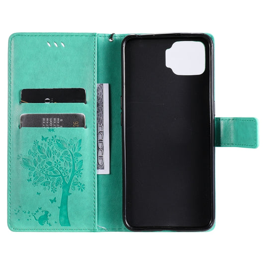 Interior card slot compartments in tree cat patterned wallet case