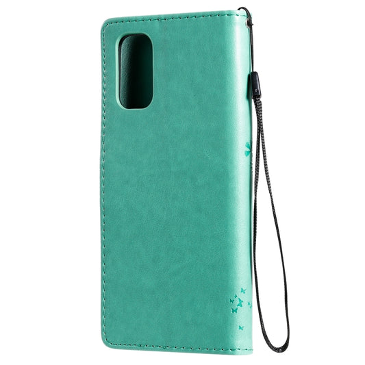 Front cover detail showing tree and cat artistic pattern on Realme case
