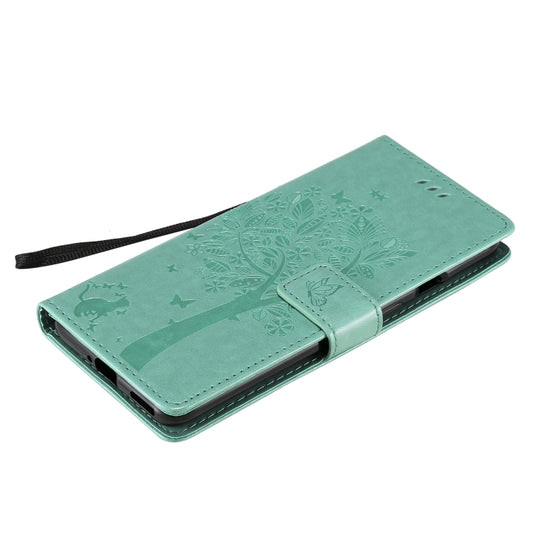 OPPO Reno4 Pro 4G wallet case with tree and cat artwork front view