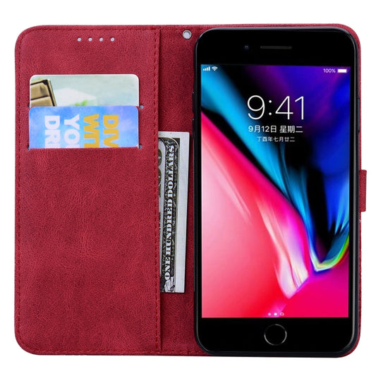 Retro skin-feel leather flip case showing butterfly relief detail and interior card compartments