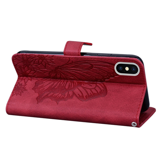 Close-up of debossed butterfly pattern on retro leather case texture