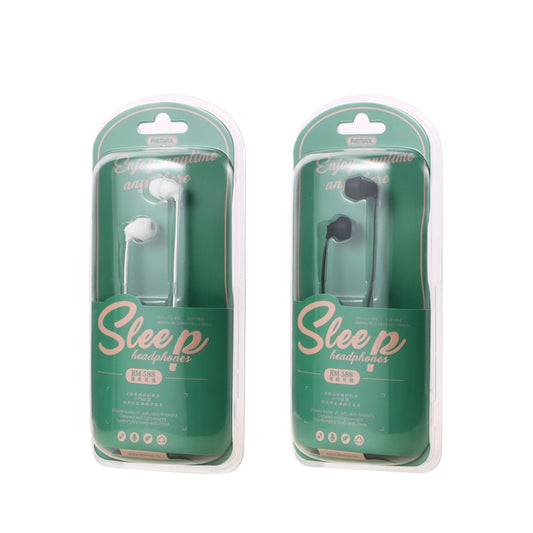 Person wearing REMAX RM-588 stereo earbuds during sleep or relaxation