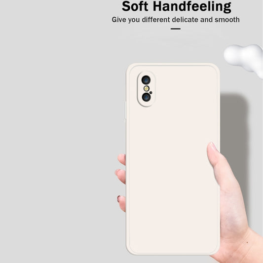 iPhone XS case showing slim profile with impact-resistant silicone exterior and raised edges