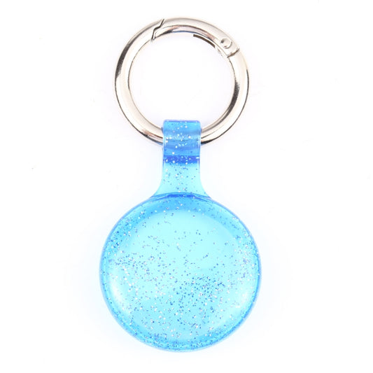 Shockproof TPU AirTag cover attached to keychain demonstrating secure fit
