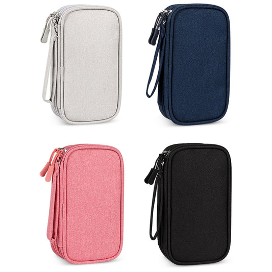 SM05 tech organizer bag with cables, chargers, and Apple accessories neatly arranged
