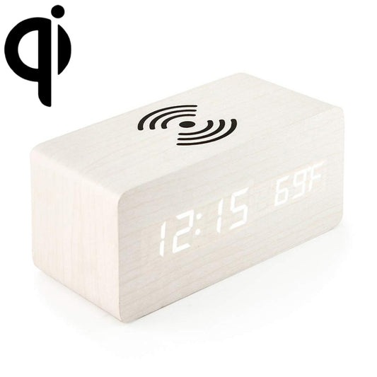 Top-down view of creative wooden qi charger with time and temperature display