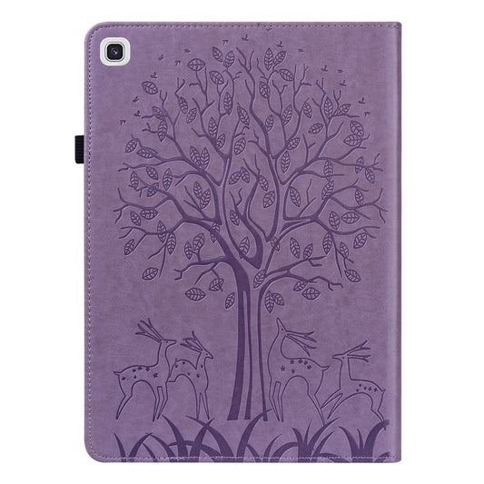 Pressed printing detail showcasing tree and deer motifs on protective tablet cover