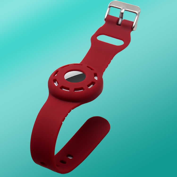 Flexible silicone AirTag strap expanding to comfortable wrist size illustration