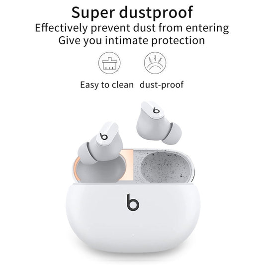 Back angle view of Beats Studio Buds with magic sound metal protective sticker applied