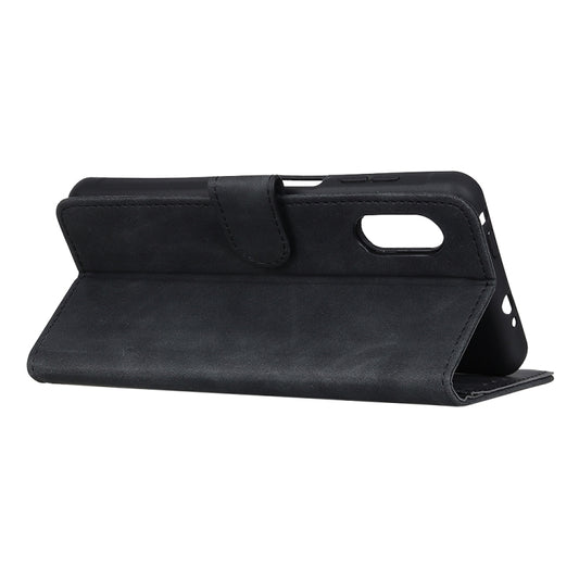 Textured leather case folded flat revealing magnetic closure and stand feature