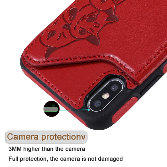Cat-themed iPhone XS Max case showing embossed texture and card slot details
