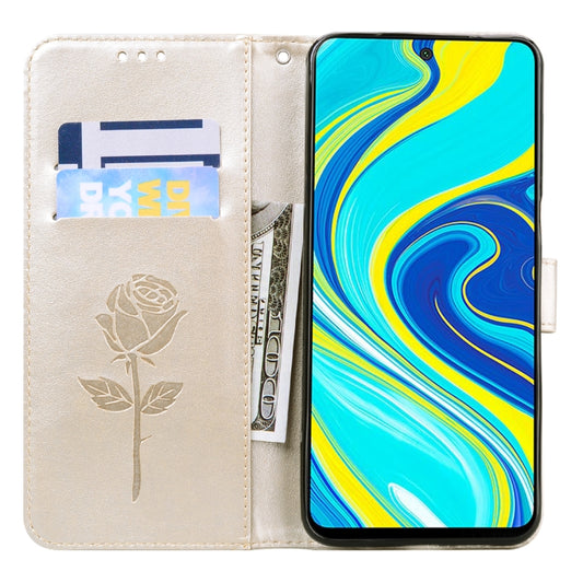 Side profile of textured leather case with rose motifs and stand feature