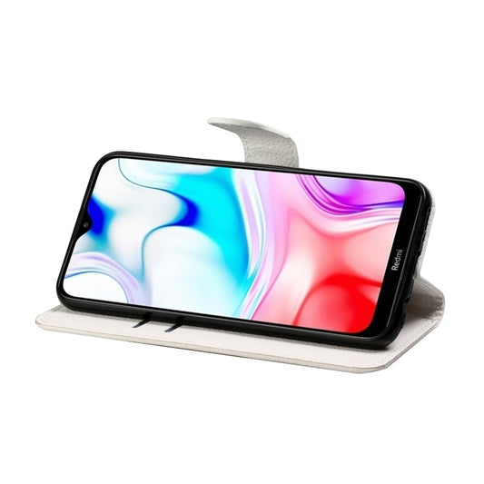 Premium flip wallet case packaging showing crystal design and device compatibility
