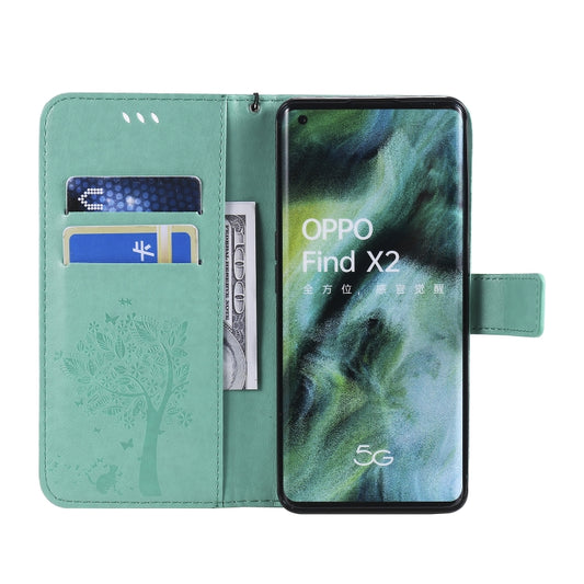 Horizontal flip PU leather phone case with decorative tree and feline pattern details