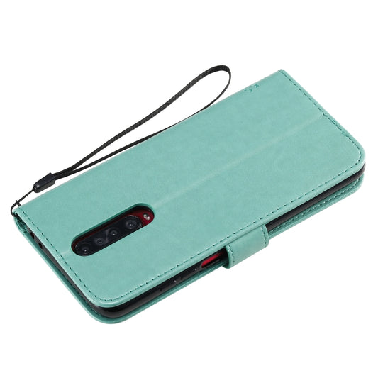 Side profile showing lanyard attachment point on forest pattern Huawei phone cover