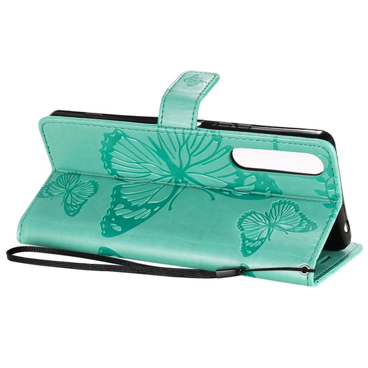 Protective leather case displaying full butterfly pattern embossment detail