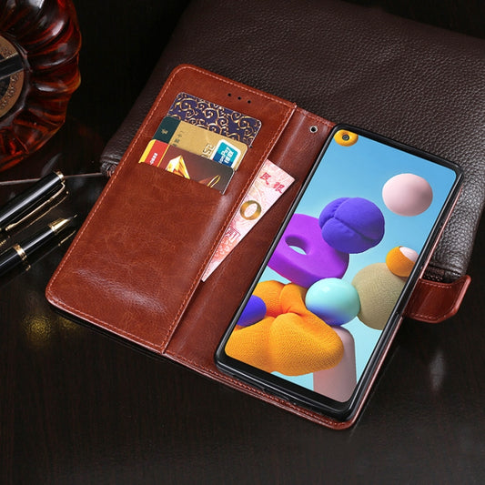 Back view of brown leather phone case showing textured crazy horse pattern detail