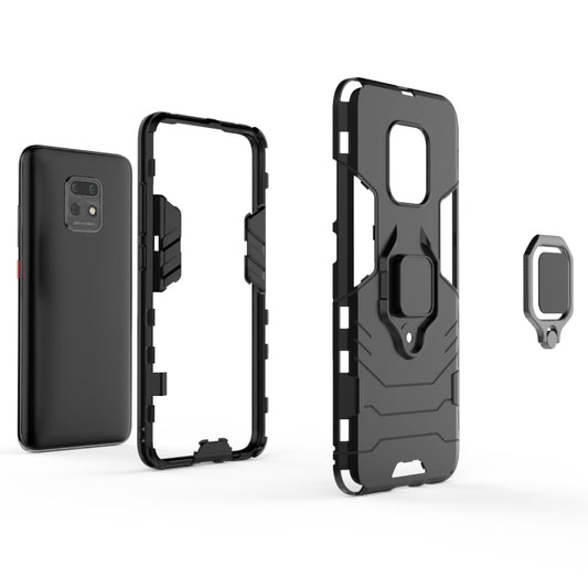 Redmi 10X 5G case in use showing magnetic ring stand positioning