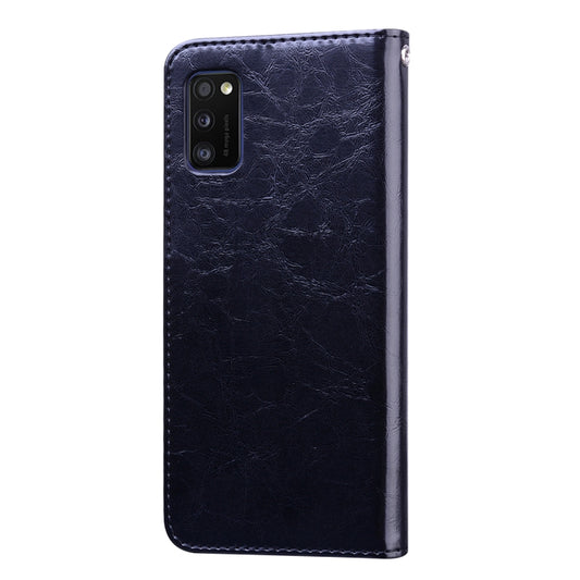 Textured oil wax leather exterior detail showing business-grade finish and quality craftsmanship