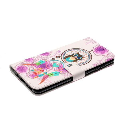 Oil-embossed pattern close-up displaying vibrant coloured drawing design on leather surface