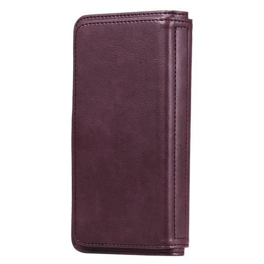 Close-up of magnetic copper buckle closure on leather wallet case for iPhone protection