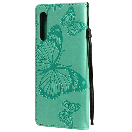 iPhone 12 mini leather case back view showing detailed 3D embossed butterflies