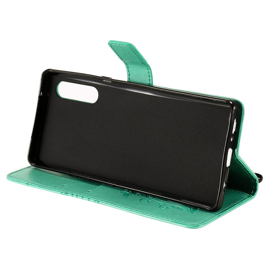 Lanyard attachment detail on premium leather butterfly case for iPhone 12 mini