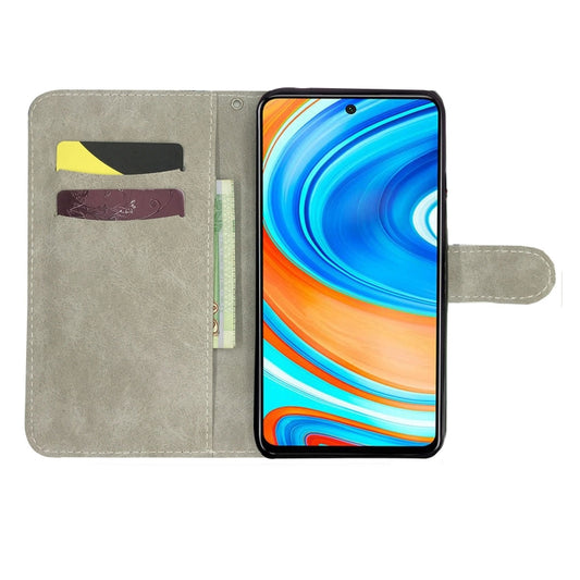 Folded leather case showing color vibrancy and protective 3D embossed design details