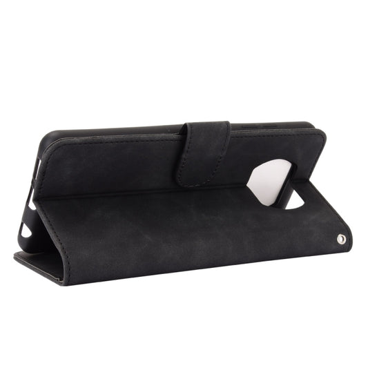 Close-up of textured calf leather surface with rich solid color finish on phone case