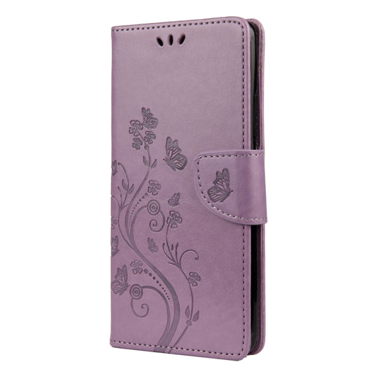 Horizontal flip wallet case featuring vibrant butterfly and floral design for Nokia 2.4
