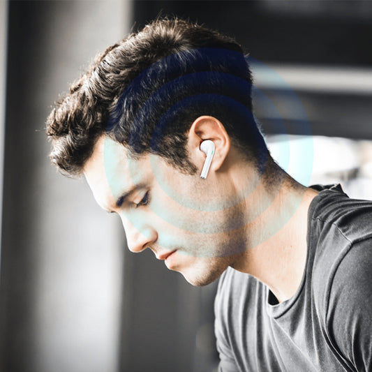 Sports TWS headset in ear highlighting secure fit for active workouts