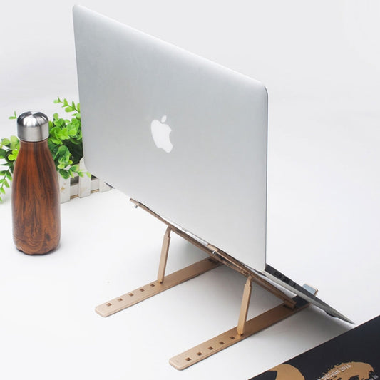 Sleek metal laptop riser with ventilation gaps cooling airflow heat dissipation technology