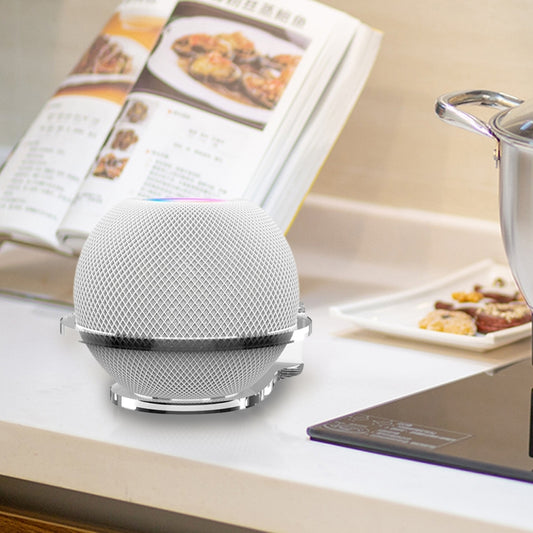 Transparent acrylic desktop stand positioning Apple HomePod Mini at optimal angle