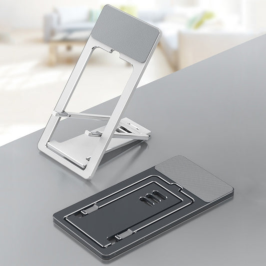 Gray silver portable phone stand featuring compact slim profile for travel