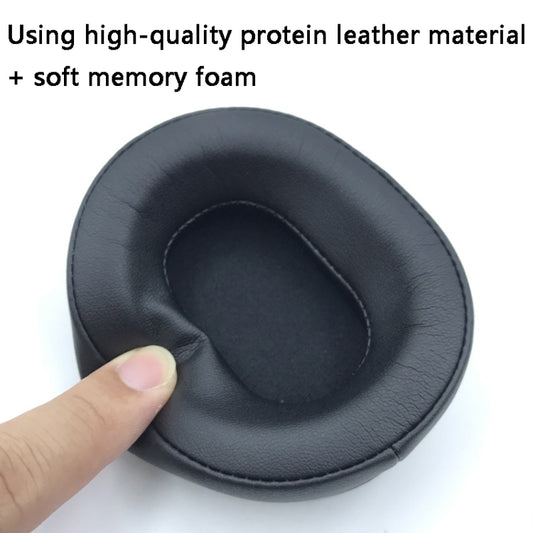 Dual-pack earmuffs showing black, black+red, and gray+blue color options