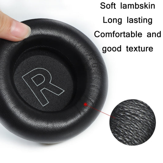 Leather earmuff replacement set installed on BeoPlay H9i wireless headphones