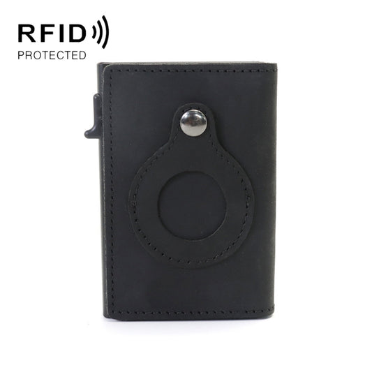 Black genuine leather mini wallet displaying AirTag pocket and multiple card slots