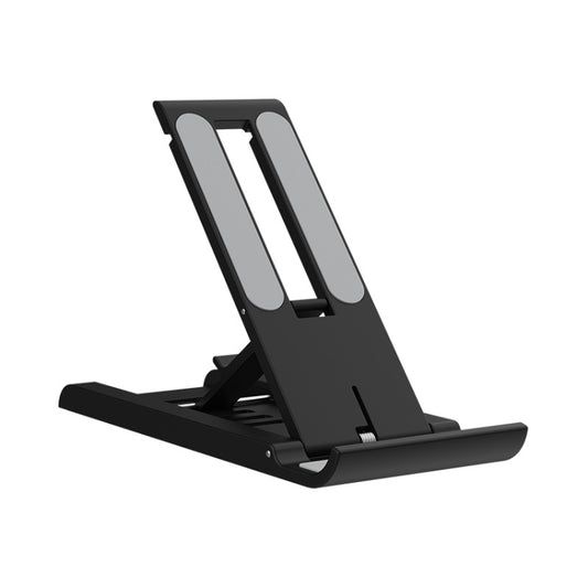 Close-up of K30 grip pads securing smartphone on portable phone holder