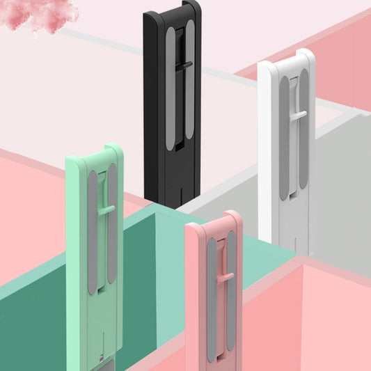 Compact folded design of travel-friendly mobile phone stand in green and black