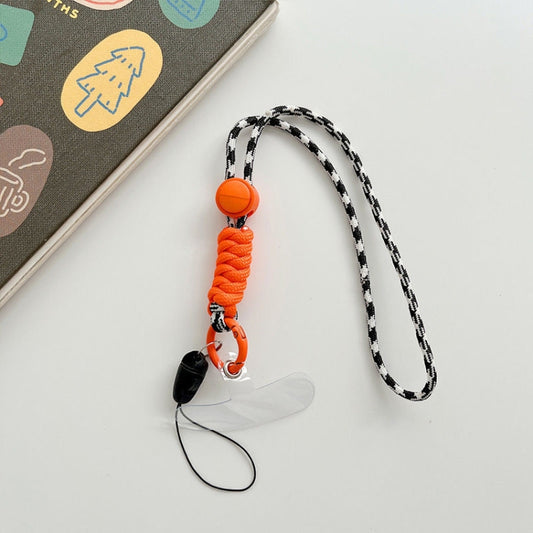 Bright patterned phone lanyard set featuring adjustable neck strap and patch attachment