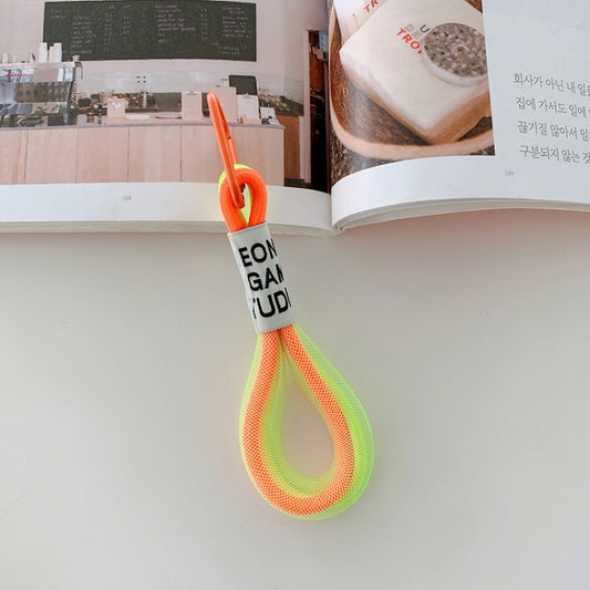 Fluorescent phone wrist straps in bold color pairs ideal for travel and everyday device security