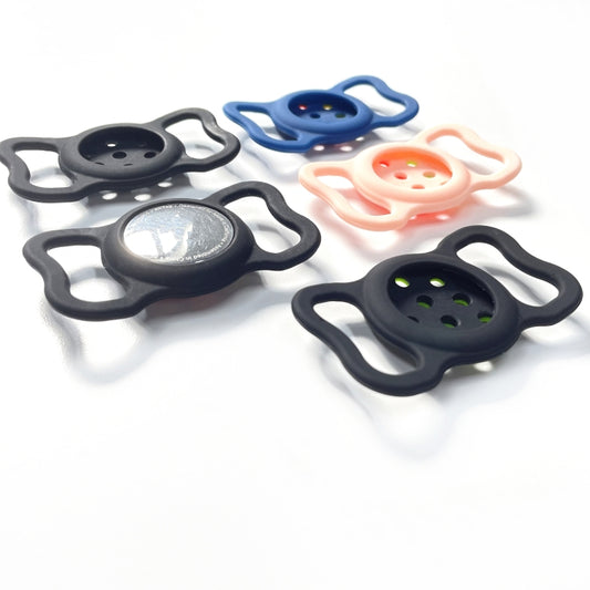 Multi-color silicone AirTag covers including pink, dark blue, black for secure pet tag attachment