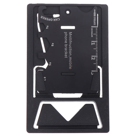 Folding phone bracket propping smartphone at viewing angle on desktop workspace