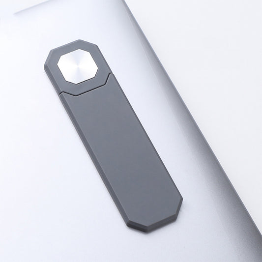 Strong magnetic base gripping smartphone firmly against laptop display