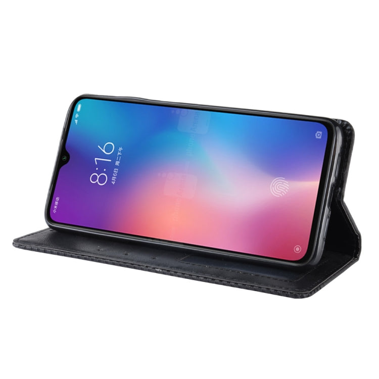 Étui à rabat horizontal en cuir à texture rétro avec boucle magnétique pour Xiaomi Mi 9, avec support, emplacements pour cartes et portefeuille.