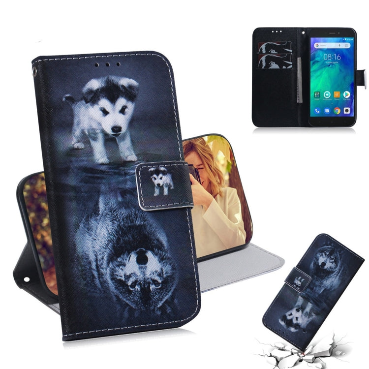 Étui à rabat horizontal en cuir avec motif loup et chien pour Xiaomi Redmi Go, avec support, emplacements pour cartes et portefeuille.